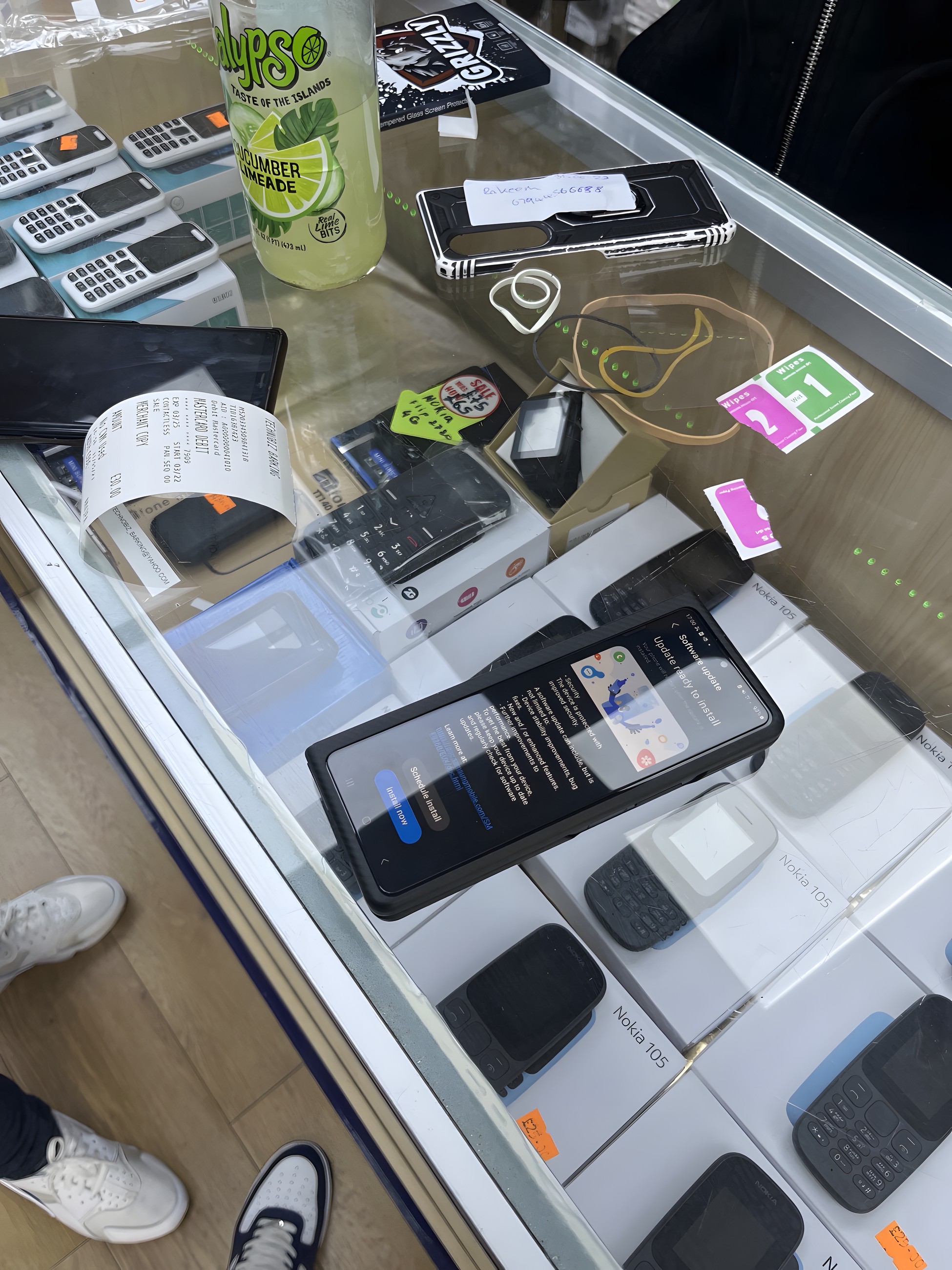 Handsets and accessories in the counter display at TECHNOBIZ BARKING